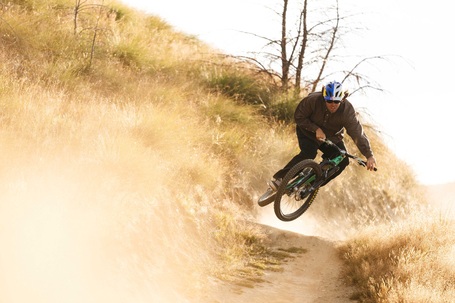 person ripping on a mountain bike