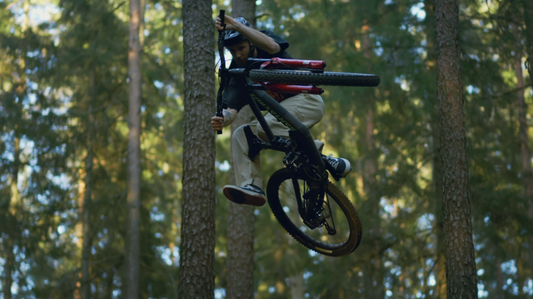 Simon Johansson hitting a big jump on his mountain bike