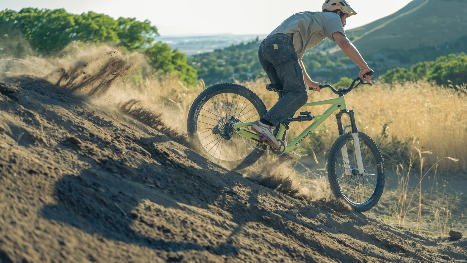 person ripping on a mountain bike