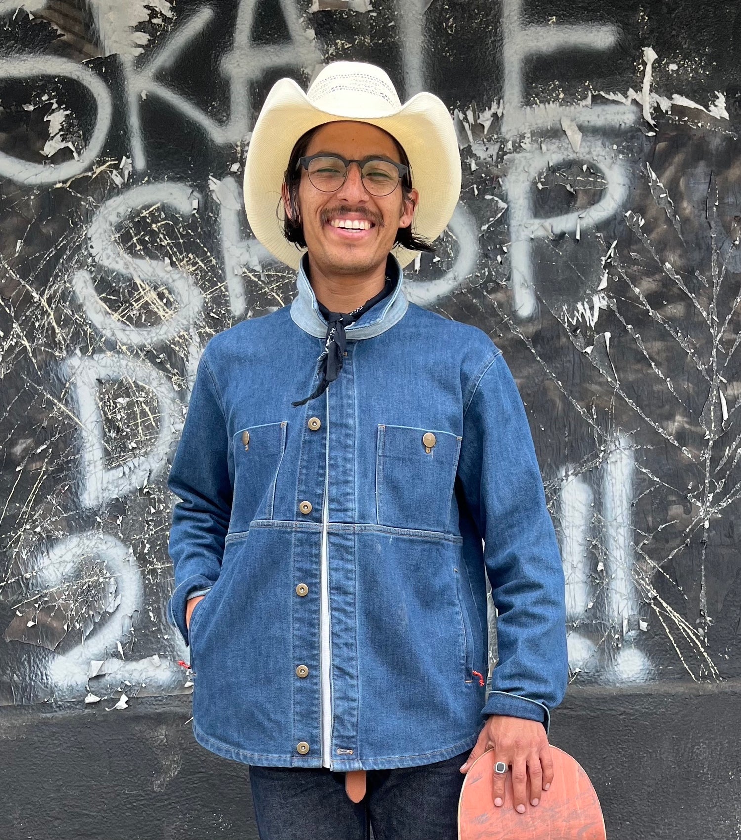 man in jean jacket