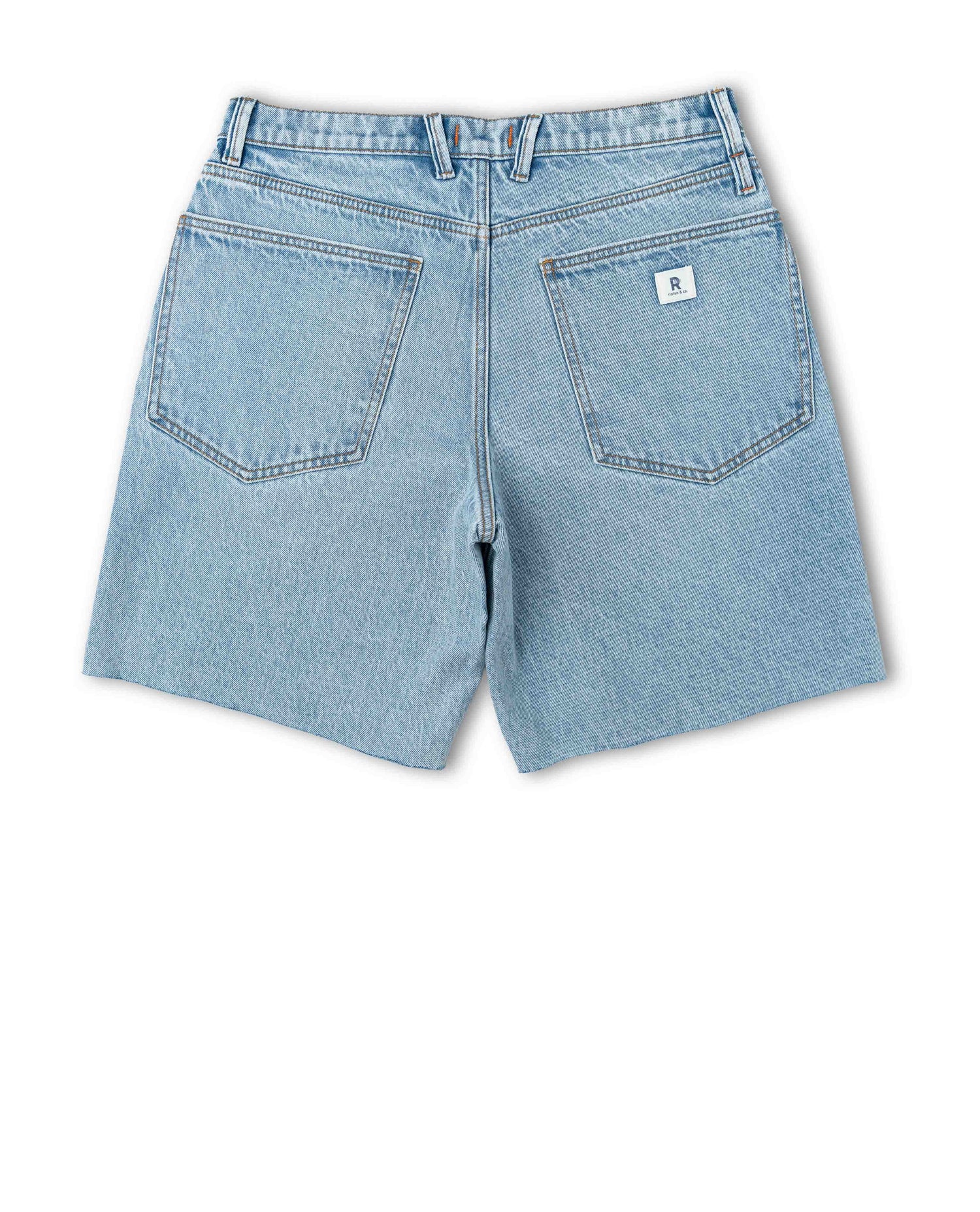 Back of light blue denim shorts on white background.