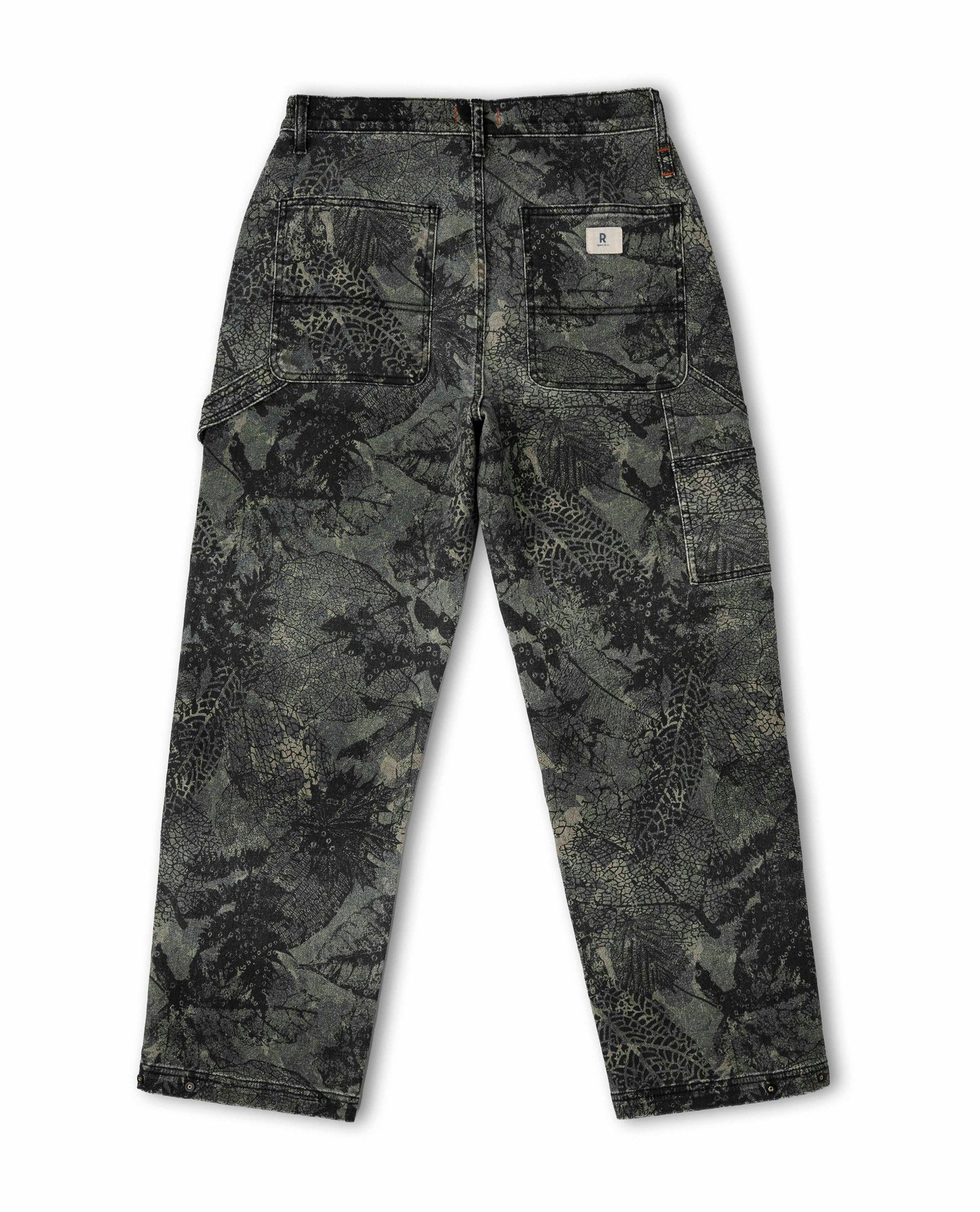 Back of leaf camouflaged patterned pants on white background. 