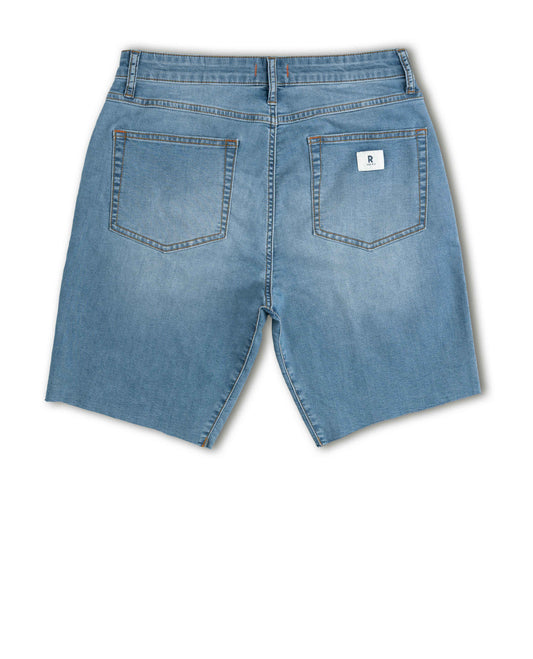 Back view of blue denim shorts on a white background