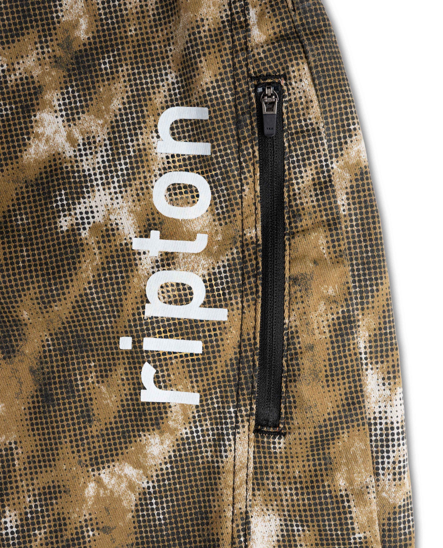 Close-up of a camouflage-patterned jacket with 'ripton' branding on a white background