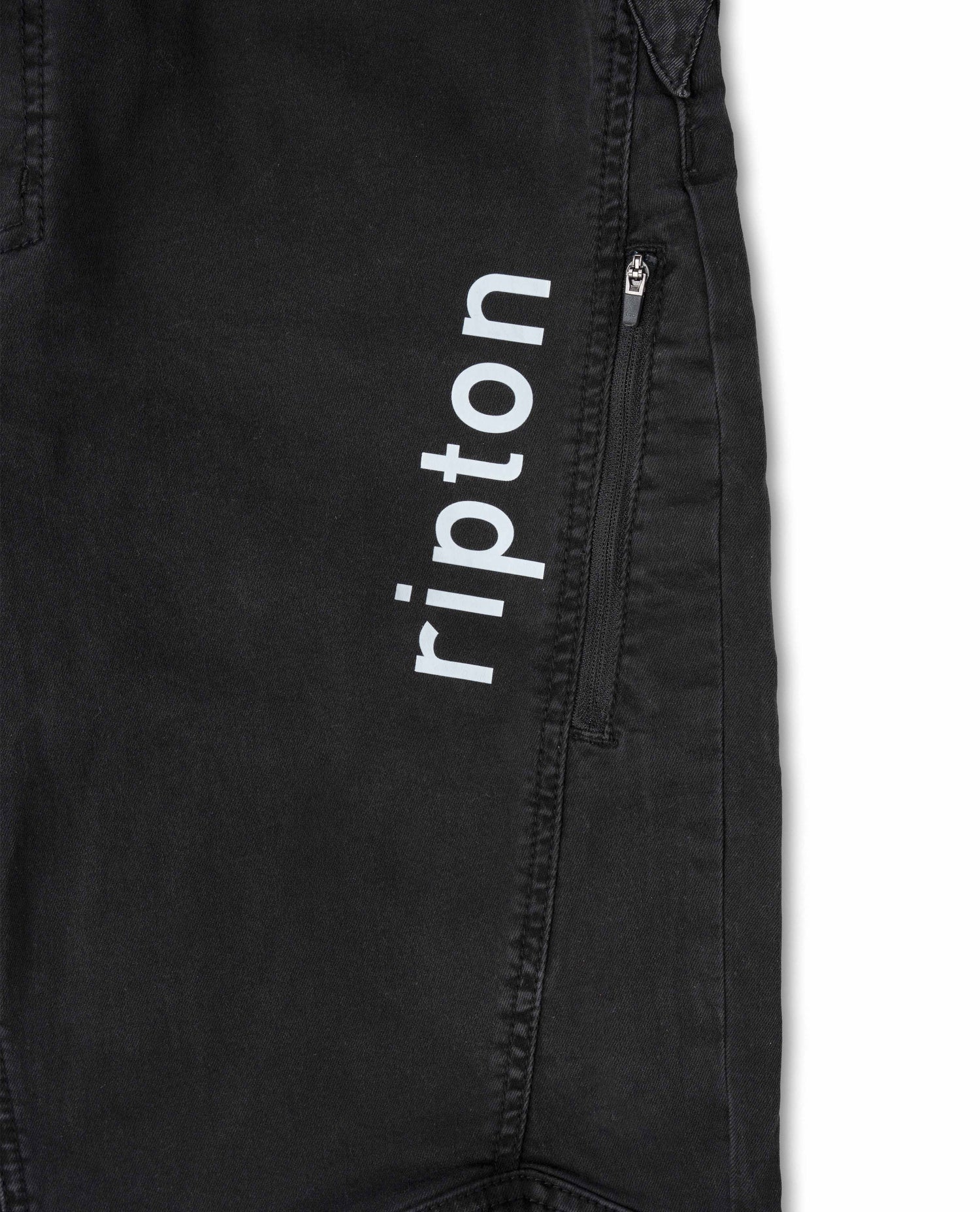 Black pants with 'ripton' logo on a white background
