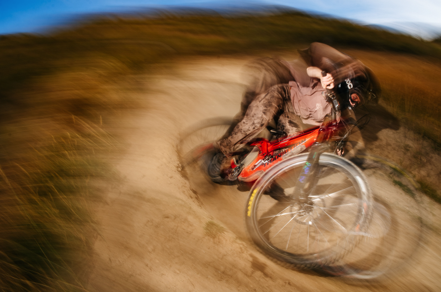 person riding a mountain bike with blur effect