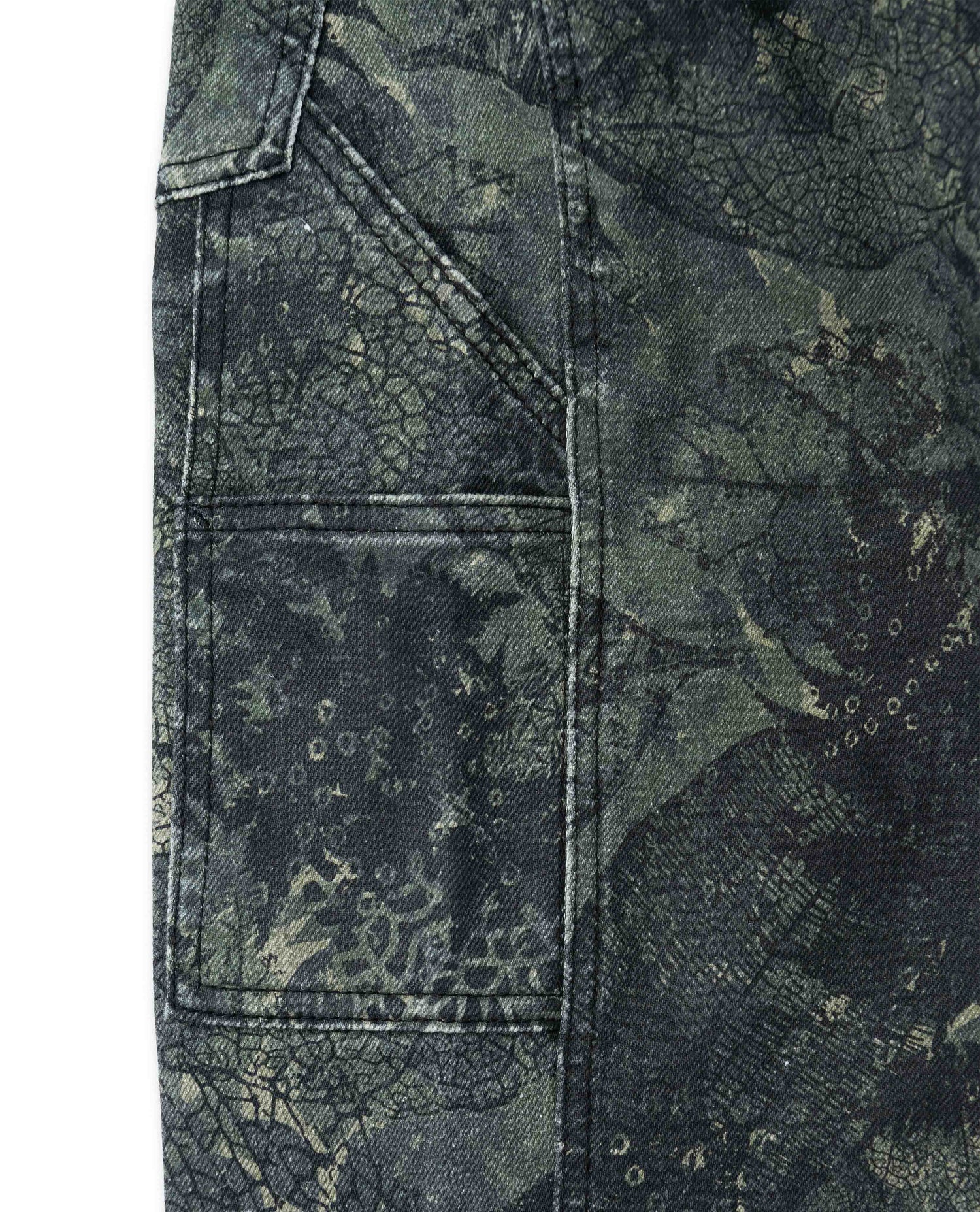 Carpenter pocket details on camo snap pant