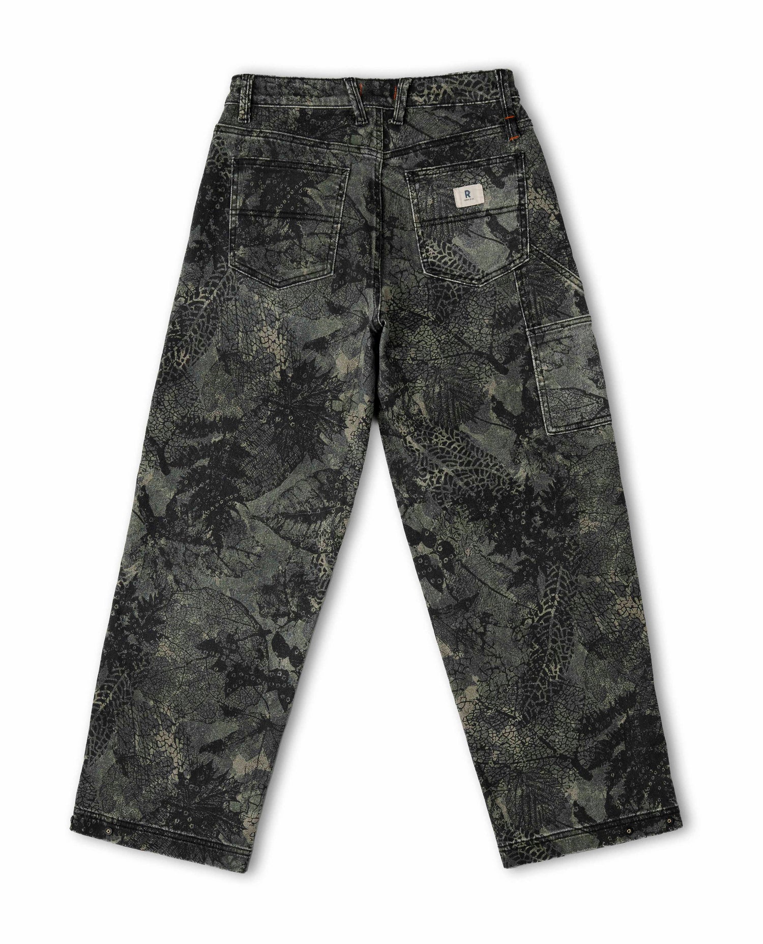 Back of camouflage leaf patterned pant on white background. 