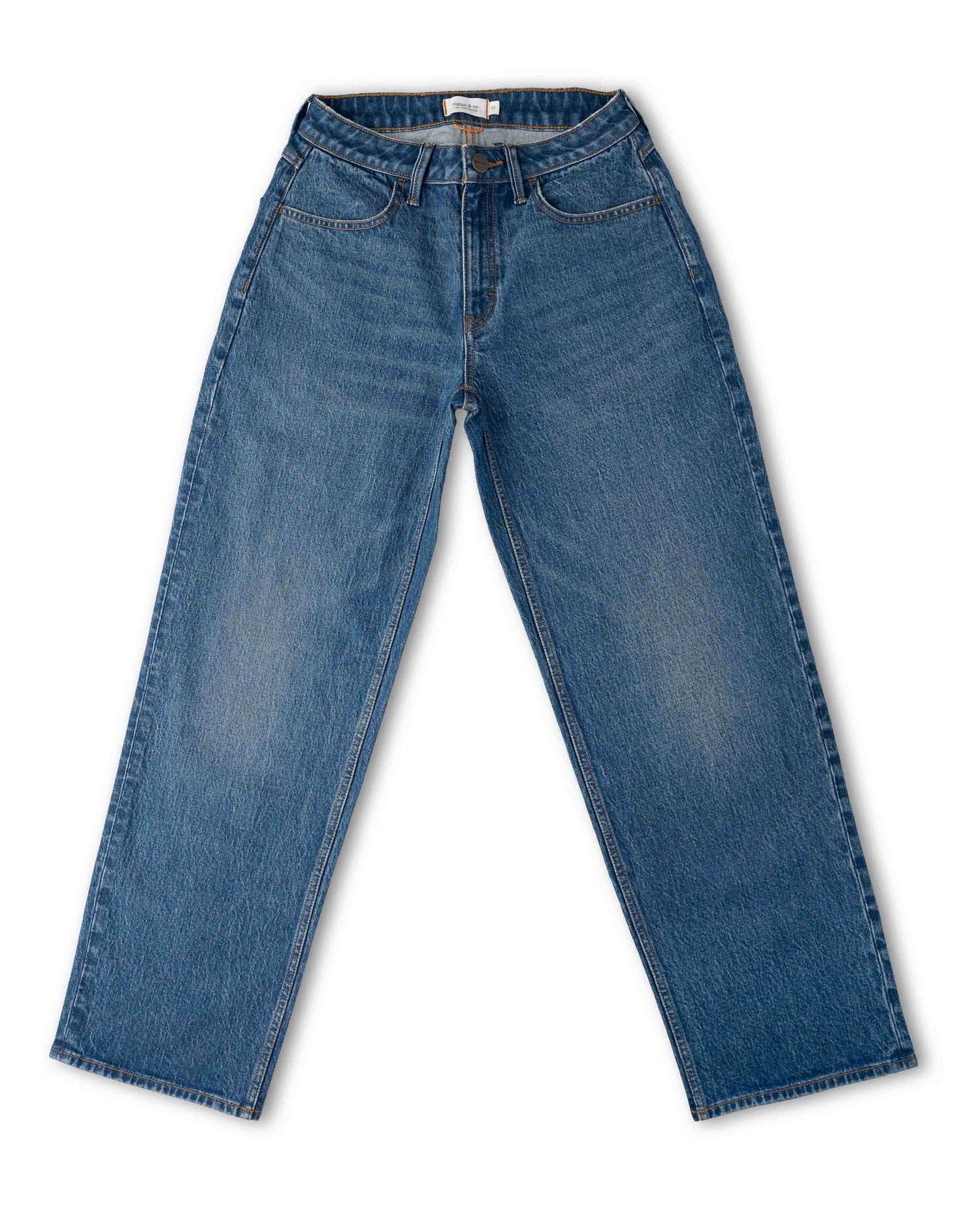 A pair of classic blue denim jeans laid flat against a white background.