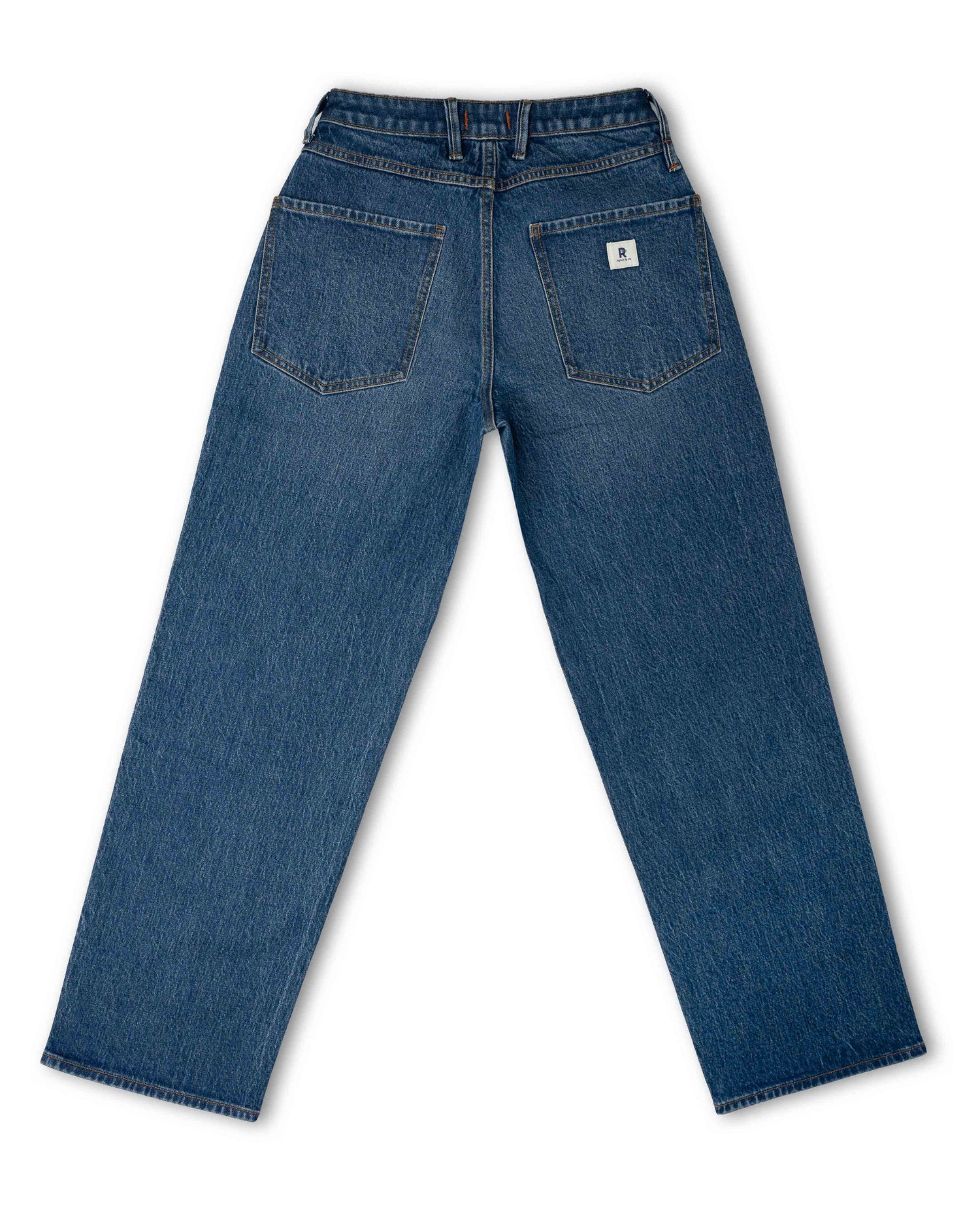 Back view of a pair of blue denim jeans with a straight-leg fit, featuring two back pockets and a small white logo patch on the right pocket.